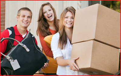 young people moving into a flat